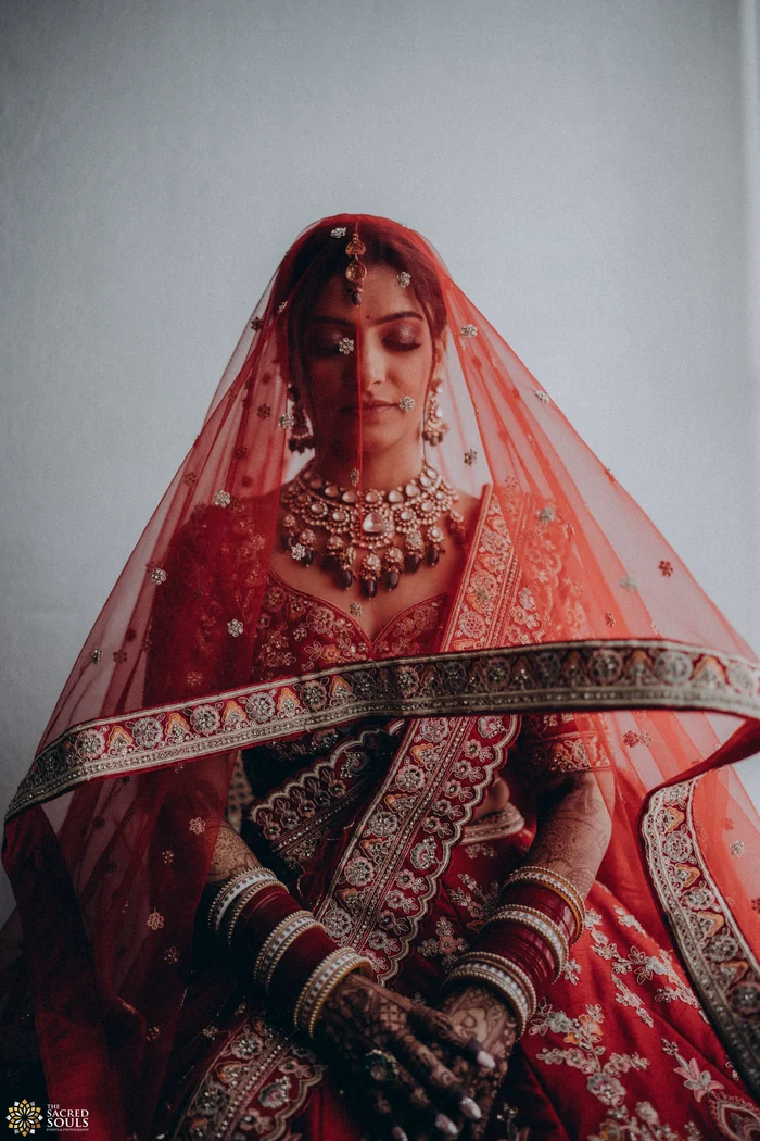 A bride under a red veil
