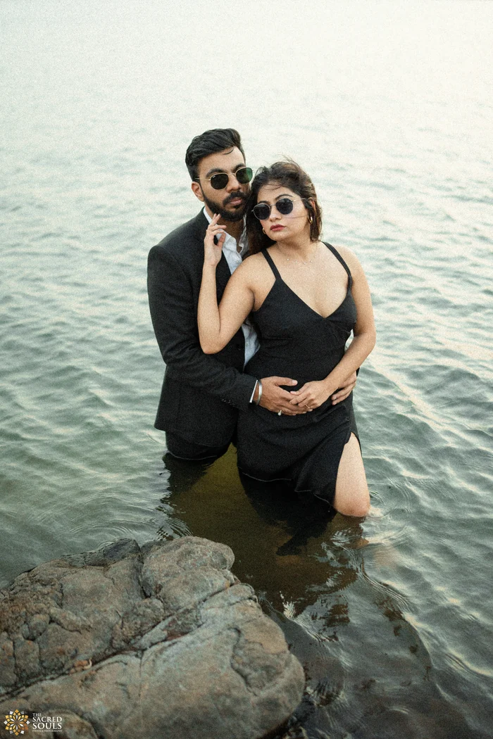 A couple embracing in the water at a lake